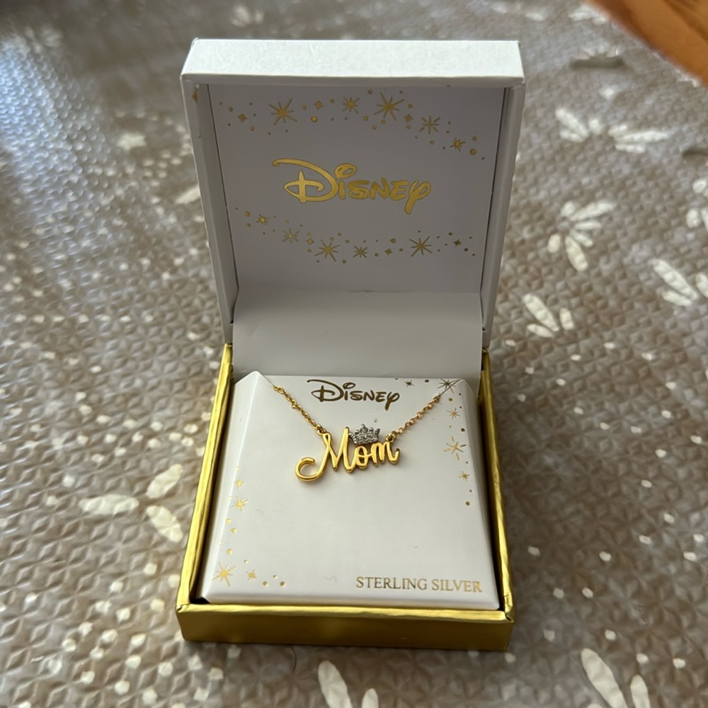 Never worn sterling silver mom Disney necklace